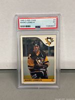 Front of graded Mario Lemieux card in PSA slab showing EX 5 grade and card artwork