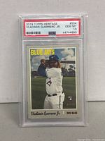 Front view of the 2019 Topps Heritage Vladimir Guerrero Jr. rookie card in PSA graded slab showing player image and card details