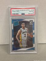 Front side of the 2017 Panini Donruss Optic Lonzo Ball rookie card encased in PSA graded slab with Gem Mint 10 label.