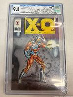 Front cover of X-O Manowar #1 in CGC slab showing grade label, artwork and price.