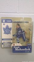 Front view of boxed Frank Mahovich NHL hockey action figure in Toronto Maple Leafs jersey