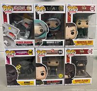 Front display of six Funko Pop vinyl figure boxes, characters visible with clear labels and images: Cyber Dragon, Mobius, General Zod, Kong, Ray Stantz, and Dark Flash.