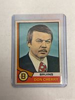 Front side of the vintage Don Cherry hockey card showing his portrait and Boston Bruins logo.