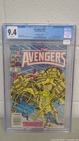 Front cover of CGC-graded Avengers #257 showing 9.4 grade label, title and main cover art