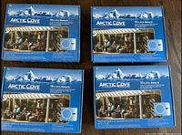 Four Arctic Cove misting kit boxes, top view