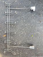 Full view of chrome faceout rack showing six arms and mounting brackets