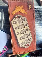 Box top showing Classic Gourmet branding and toy soldier pan illustration