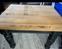 Top view showing natural pine surface and leg tops
