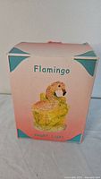 Flamingo night light in original packaging box showing colorful design and flamingo image on the box.