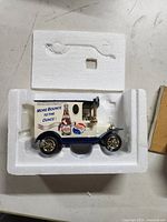 Top view of the die cast Pepsi Cola truck inside white styrofoam packaging showing the decals and overall shape.