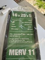Front label displaying size, brand, model, compatible systems, MERV rating
