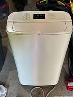 Front view showing digital control panel and casing