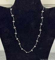 Full view of sterling silver beaded necklace