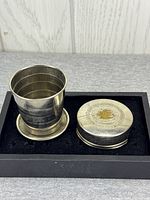 Cup expanded beside lid