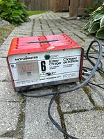 Front view showing brand, 6 amp rating, ammeter, overload protection label