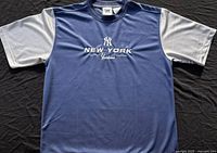 Front view showing NY Yankees graphics and color blocking