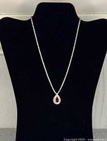 Full view of rhinestone necklace displayed on bust