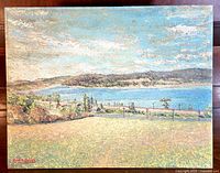 Full view of the oil on board landscape painting showing the entire artwork with a natural, textured scenic landscape including land, water, hills, and sky.