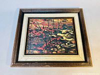 Overview of one framed print showing the full image and frame with red maple artwork.