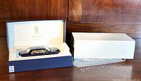 Full view of the Rolls Royce Silver Seraph model car in original blue and white box with foam inserts and outer protective cover.