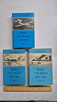 Front covers of three volumes of 'British Civil Aircraft since 1919' showing cover images of civil aircraft and blue dust jackets.