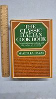 Front cover of 'The Classic Italian Cookbook' by Marcella Hazan showing the book title, author's name, and a brief description of the content.