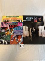 Lot of four vintage vinyl records with diverse album covers including Buffalo Springfield, Stephen Stills, Mick Taylor, and Crosby Stills & Allies.