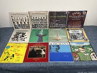 Photo showing 10 vinyl records with classical music themes. Records include Great Performances with Billy the Kid Rodeo, Copland Appalachian Spring Suite, Antonin Dvorak's New World Symphony, Handel's Messiah, and others with various orchestras and symphonies.