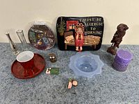 Lot overview showing all 12 decorative items arranged on a flat surface.