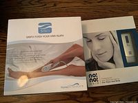 Box of Silk'n hair removal device showing branding, product image of device being used on leg, and text about physician recommendation and safe at-home use.