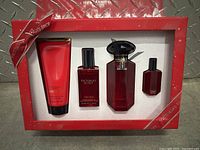 Photo of Victoria's Secret Very Sexy gift set showing four items in original red packaging with ribbon design.