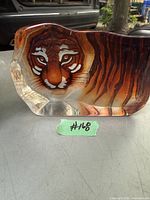 Front view of the Mats Jonasson Maleras Bengal tiger crystal sculpture showing detailed tiger face artwork inside the clear crystal block.