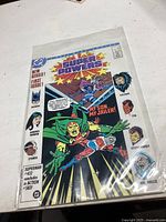 Full cover of the DC Super Powers comic book featuring main characters and dramatic artwork.