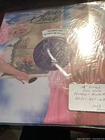 Front cover close-up showing the Dance With Dolly colored vinyl single.