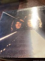 Gino Vannelli The Gist of Gemini album cover front with portrait of artist and reflective glare.