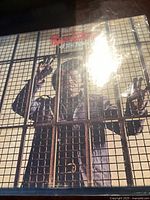 Front cover of James Brown's "Revolution of the Mind" record showing James Brown behind bars on the album cover.