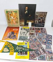 Wide view showing the collection with Star Trek cards in sleeves, Sinatra photograph, movie playbills, Kennedy pennant, and other paper memorabilia