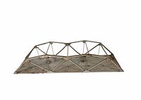 Side view showing the triangular truss structure and rectangular base with metal cross supports and signs of rust.