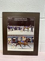 Wooden plaque with 2008 Flamboro Downs racing images and event text.