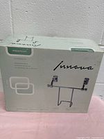 Box front showing the nickel metal magazine rack illustration and brand Innova Prestcot