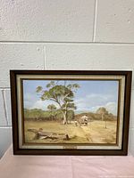 Full view of the framed oil painting showing an Australian rural scene with a sheep drover on horseback, sheep, trees, and a fence in the background.