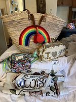 Overview of four bags on surface