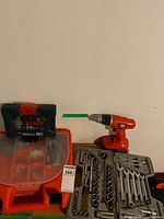 Overall lot showing cordless drill, Bosch bit set, organizer, socket set