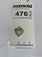 Pendant on lot card showing overall design and scale