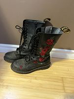 Full view of both boots standing