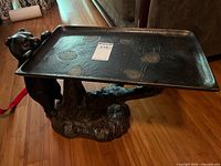 Full view of bear end table with tray top showing overall design
