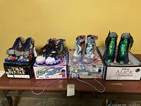 Group shot of all four shoe pairs on their boxes