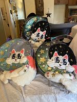 Three Irregular Choice round handbags showing all colorways and celestial cat design