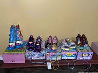 All five pairs on their original boxes