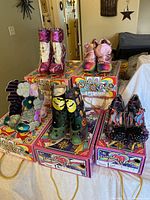 Group shot of five unworn pairs on Irregular Choice boxes